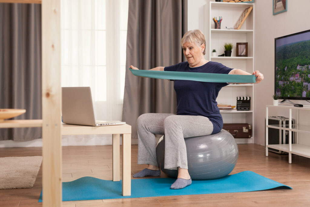 60 years old woman exercising FMKBJ7S